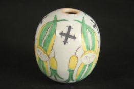 A TURKISH OTTOMAN ARMENIAN POTTERY HANGING BALL, 8cm.