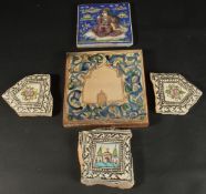 A PERSIAN QAJAR GLAZED POTTERY TILE AND CORNER TILE (in three pieces), together with another