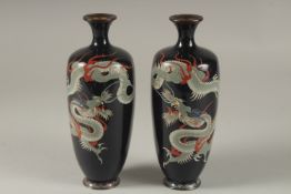A FINE PAIR OF JAPANESE MIDNIGHT BLUE GROUND CLOISONNNE ENAMELLED VASES, decorated with dragons,
