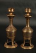 A VERY FINE PAIR OF 19TH CENTURY NORTH INDIAN GOLD INLAID STEEL CANDLESTICKS, 18.5cm high.