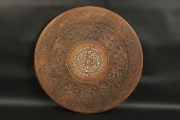 A FINELY CARVED ANGLO INDIAN BONE INLAID CIRCULAR WOODEN TABLE TOP, carved with foliate designs,