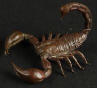 A BRONZE OKIMONO OF A SCORPION.