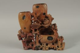 A LARGE CHINESE CARVED SOAPSTONE GROUP, 22cm high.