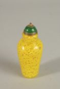 A FINE CHINESE PEKING GLASS BOTTLE, with specks of gold and green stone stopper - possibly jade, 8.