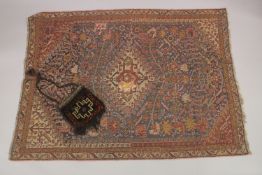 A KASHKARI TRIBAL RUG, together with small saddle bag, (2).