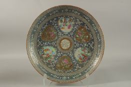 A VERY FINE CHINESE CANTON ISLAMIC MARKET PORCELAIN CHARGER, beautifully decorated with central