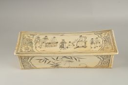 A VERY LARGE CHINESE GLAZED POTTERY PILLOW, painted with figures and animals, 45cm long.