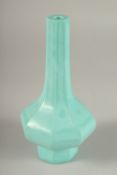 A FINE CHINESE OCTAGONAL TURQUOISE PEKING GLASS BOTTLE VASE, 19cm high.