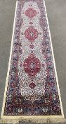 Ivory ground runner with floral medallion design 300cm by 80cm