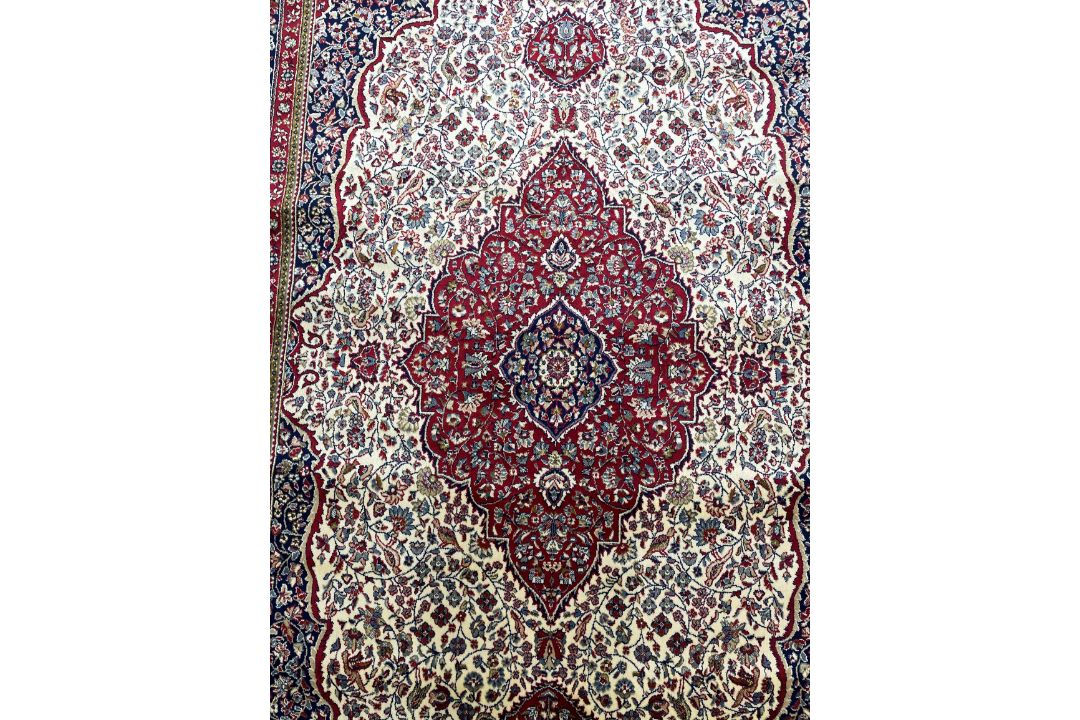 Ivory ground Persian carpet with traditional medallion design 230cm by 160cm - Image 2 of 3