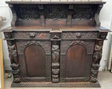 Late 19th century heavily carved oak sideboard L171cm Ht 157cm D 59cm