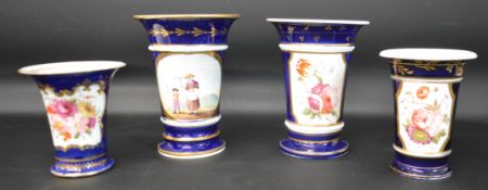 Four nineteenth century porcelain flared rim spill vases, two larger (15cm high) and two smaller (