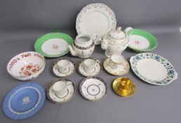 Collection of ceramics includes Wedgwood, blue and gold teacups and saucers with matching teapot