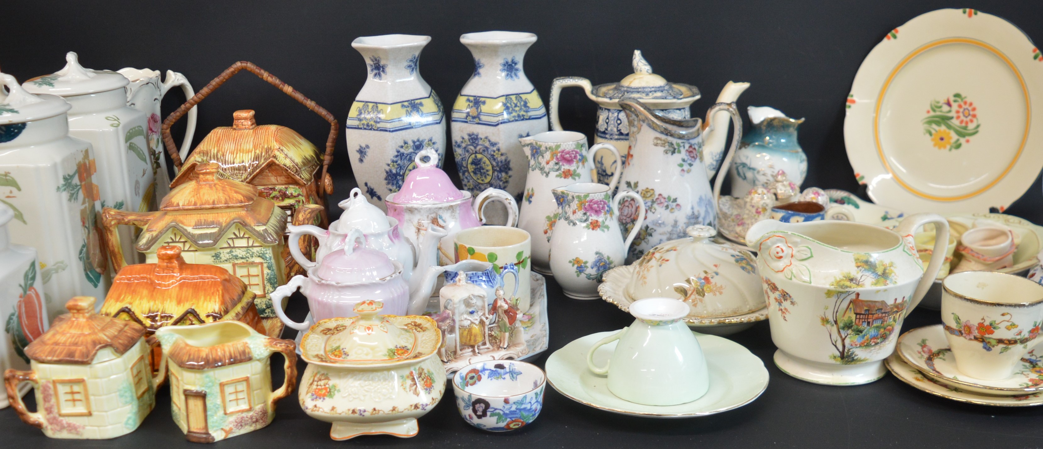 Selection of mixed ceramics including cottage ware, storage canisters etc.