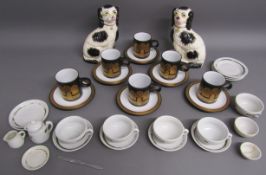 Hornsea Midas cups and saucers, Keefe pottery fire dogs and a child's tea set