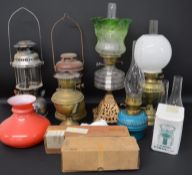 Selection of paraffin lamps including Tilley & Anchor, cast & brass lamps & spare chimneys etc.