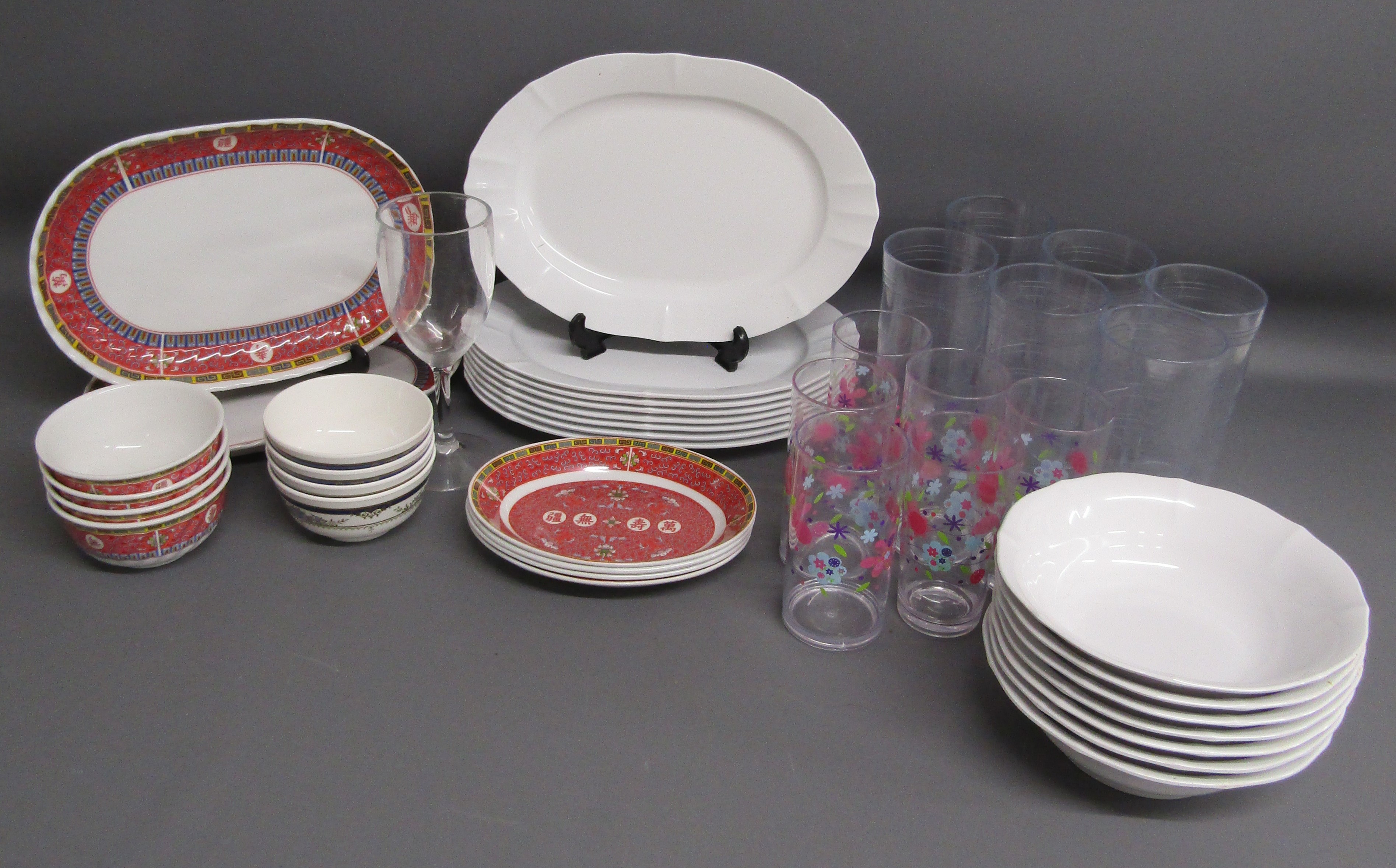 Collection of plastic table ware includes Oriental design Fataco plates and bowls, white melamine