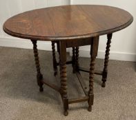 Wooden table on barley twist legs