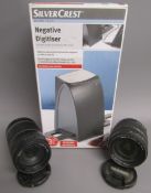 Canon EF-S 55-250mm lens, Tamron AF Ashperical XR 28-300mm lens and Silvercrest negative digitiser