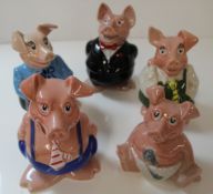 Set of Nat West Piggy Banks, consisting of Sir Nathaniel Westminster, Lady Hilary and daughter