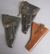 3 leather holsters 2 black with brass fixings and one open topped brown leather stamped H.G.R.I.S