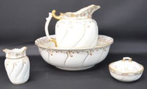 Early 20th century toilet set with hand painted & gilded decoration, comprising jug, bowl,
