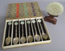 Boxed set of 6 Chinese silver spoons with decorative floral stem and set with circular jade