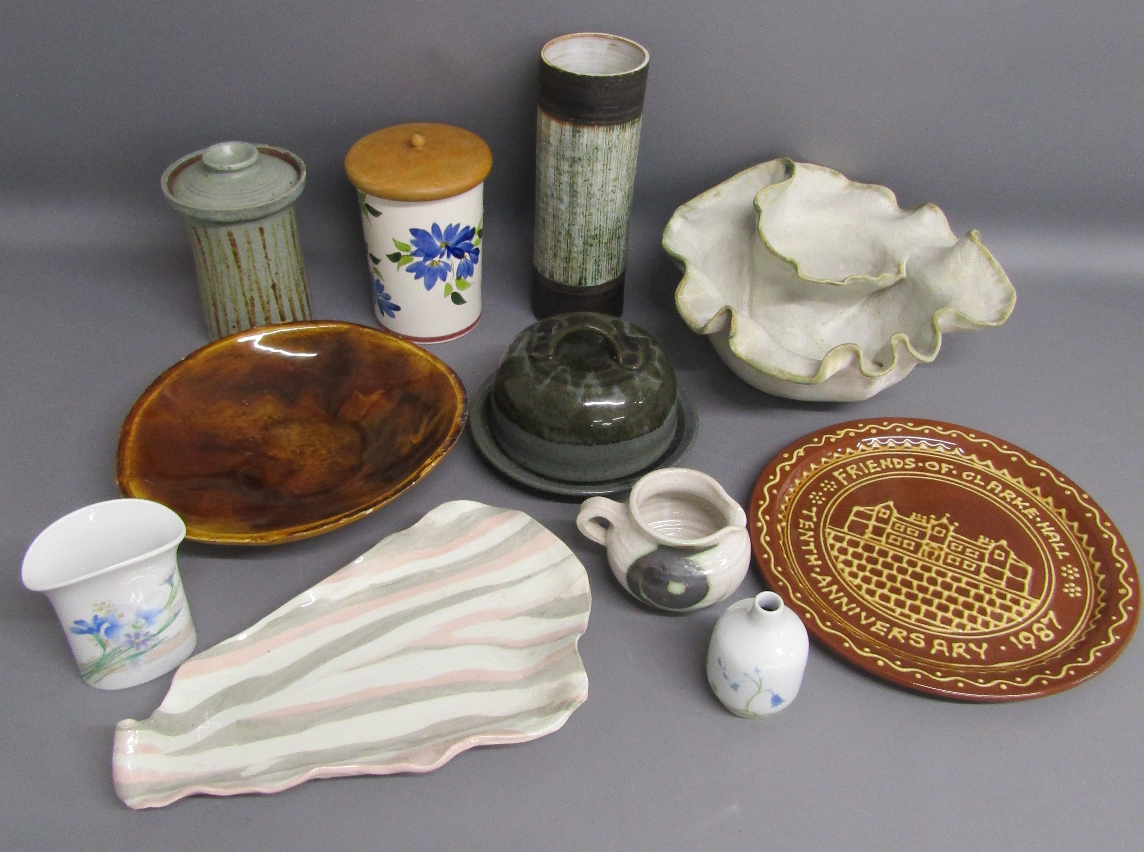 Collection of modern studio ware includes pink and grey freeform plate, segmented bowl, cream jug,