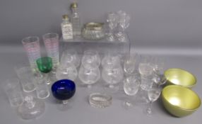 Collection of glassware includes sherry glasses, liqueur glass, cobalt blue sundae dish, cut glass