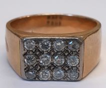 Gents gold ring (tests as between 9 - 14ct) set with 12 diamonds, approx. 0.45ct - ring size 2 -