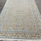 Fine woven Iranian carpet with gold embossed floral pattern 2m by 3m