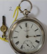 American Waltham open face silver pocket watch with key, working. Serial number 8449412