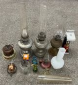 Collection of paraffin lamps including miniatures & glass funnels
