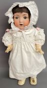 Early 20th century bisque head doll by Armand Marseille with sleepy eyes Ht 51cm