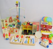 Collection of original vintage Fisher-Price toys includes chatter telephone, hickory dickory dock