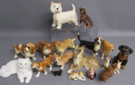 Collection of ceramic dogs and a ceramic cat