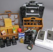 Collection of items including wicker picnic basket, tea, coffee, sugar, utensils jars, foot