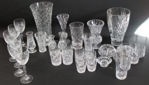 Large amount of crystal glassware including various sized glasses, vases, lids etc