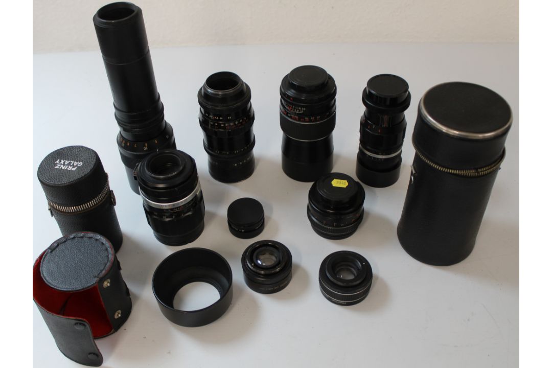 Selection of camera lenses with screw fitting, Prinz Galaxy 135mm with hood and case, Mirage Auto