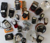 Assorted flash guns, exposure meter and wind meter. Various flash guns including Prinz, Olympus,