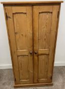 Pine cabinet with chamfered panels Ht 141cm W 71cm