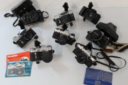 Selection of Olympus and Zenit cameras to include, OM101 power focus, and 3 x OM10 ( i x with case.)