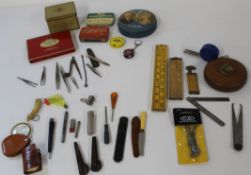 Selection of tape measures and rulers (wood and steel), selection of old tins, selection of tweezers