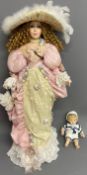 The Leonardo Collection Elite Range doll in Edwardian costume & a small doll in a sailors outfit