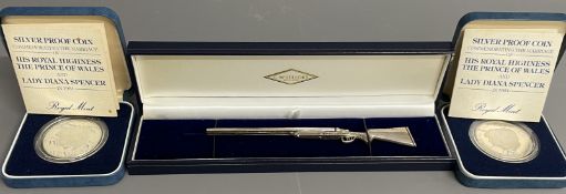 2 Charles & Diana 1oz silver proof coins & a silver miniature shotgun (1.38ozt)