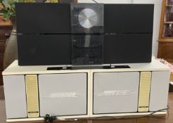 Bang & Olufsen Beosound wall mounted CD & cassette player with a pair of Bose speakers