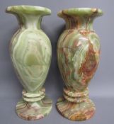 Near pair of onyx/marble vases - approx. 30cm tall, 14mm wide (repair to base of one) marked DELLA
