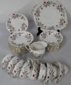 Royal Standard part tea set comprising 1 cake plate, 11 tea plates, 11 saucers, 8 cups, 1 milk jug