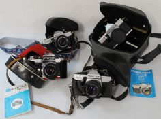 Selection of Praktika cameras to include TL1000, Super TL, MTL5, Nova II in camera case with flash