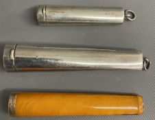 2 silver cigar holder cases (1.3 ozt) one with cigar holder with 9ct gold collar (repaired)